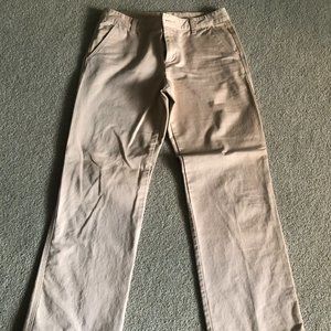Pale pink trousers and khaki sport pants
